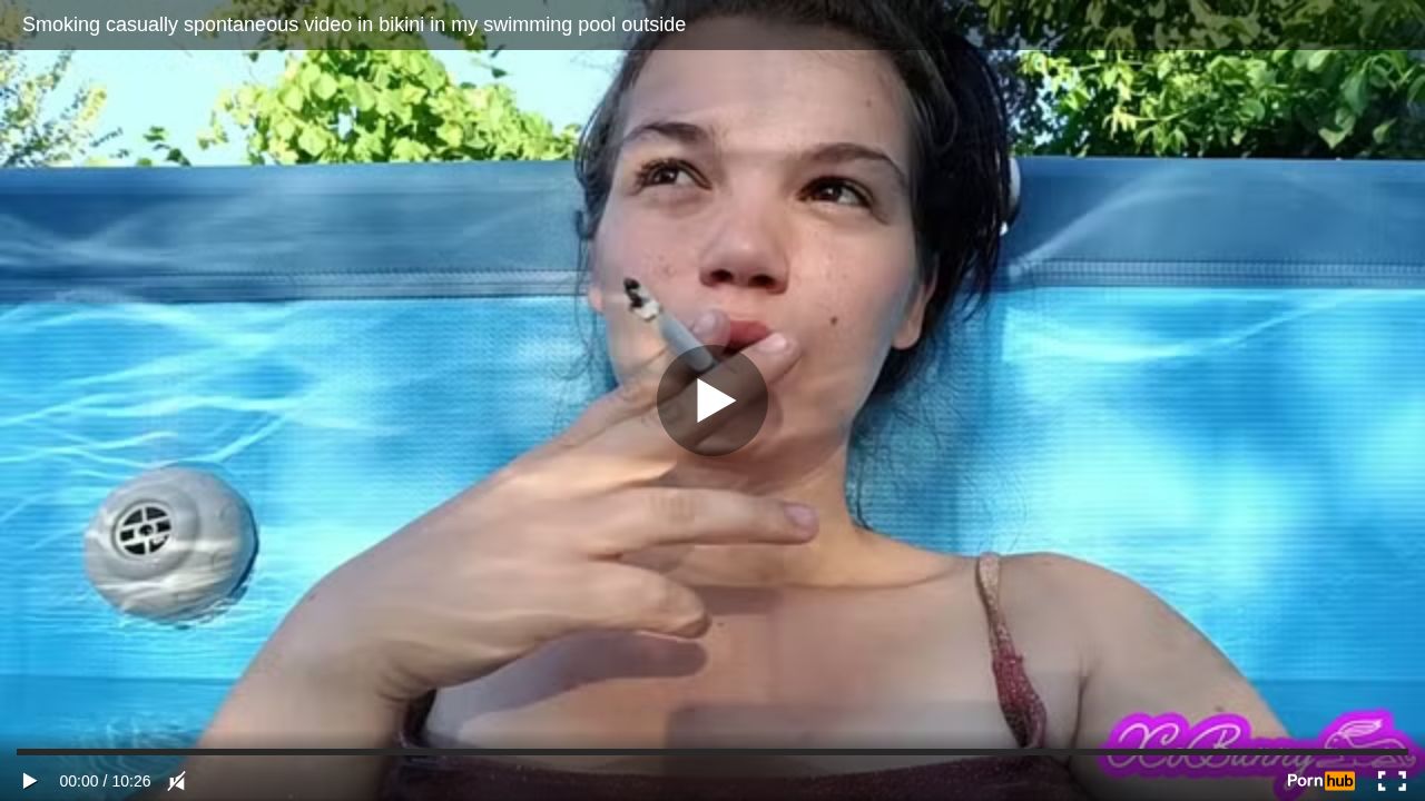 Smoking casually spontaneous video in bikini in my swimming pool outside