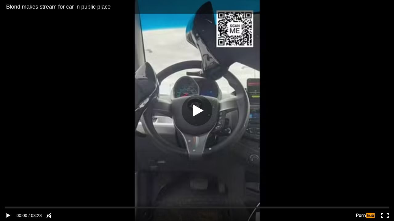 Blond makes stream for car in public place